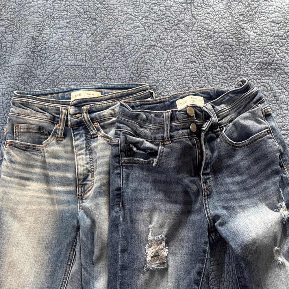 Buckle Distressed Skinny Jeans in Blue